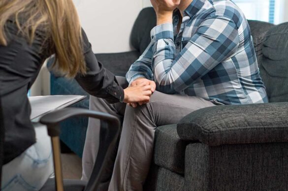 A counsellor having a session with a man on "impact of elderly relatives on working professionals" I LegalTechMunch