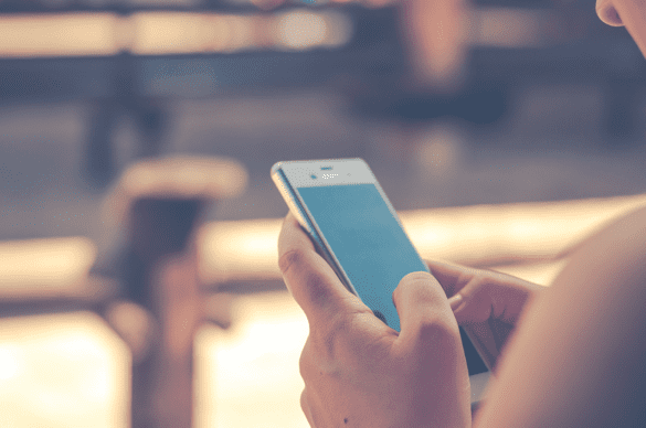 Girl using phone | LegalTechMunch