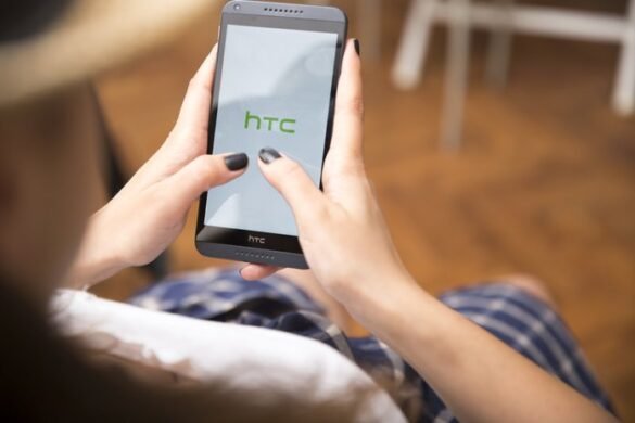 A woman using HTC mobile phone I LegalTechMunch