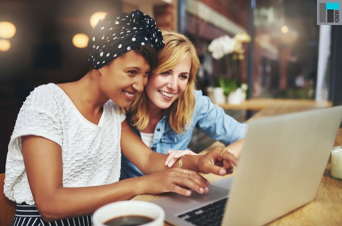 Two Girls Passing their Time Using Applications on the Laptop | LegalTechMunch