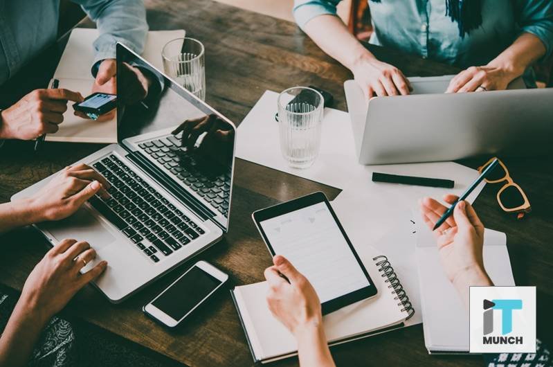 A Group of People working Using Various Electronic Devices | LegalTechMunch