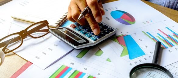 A man using calculator I LegalTechMunch