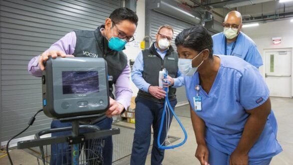 Instructor explaining GM ventilators functioning to nurse I LegalTechMunch