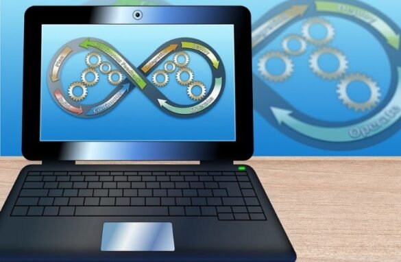 DevOps logo concept on a laptop and background