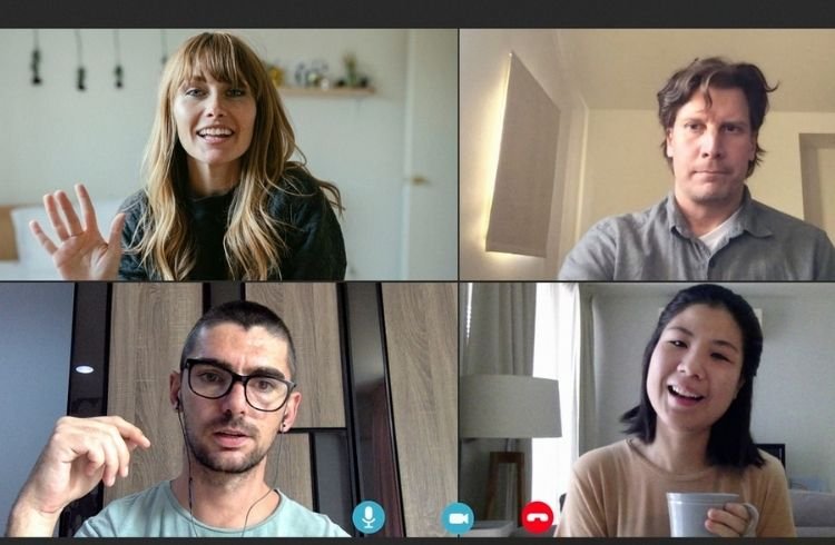 Colleagues having a video conference while working from home