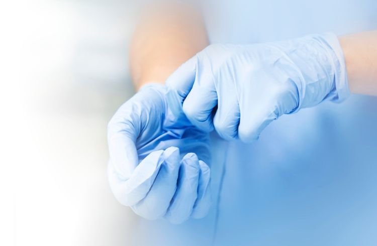 Wearing gloves to prevent the spread of coronavirus