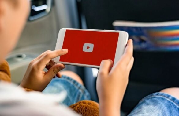 Boy using Youtube application