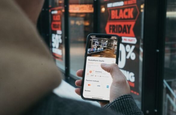 A user going through Black Friday deals on a mobile